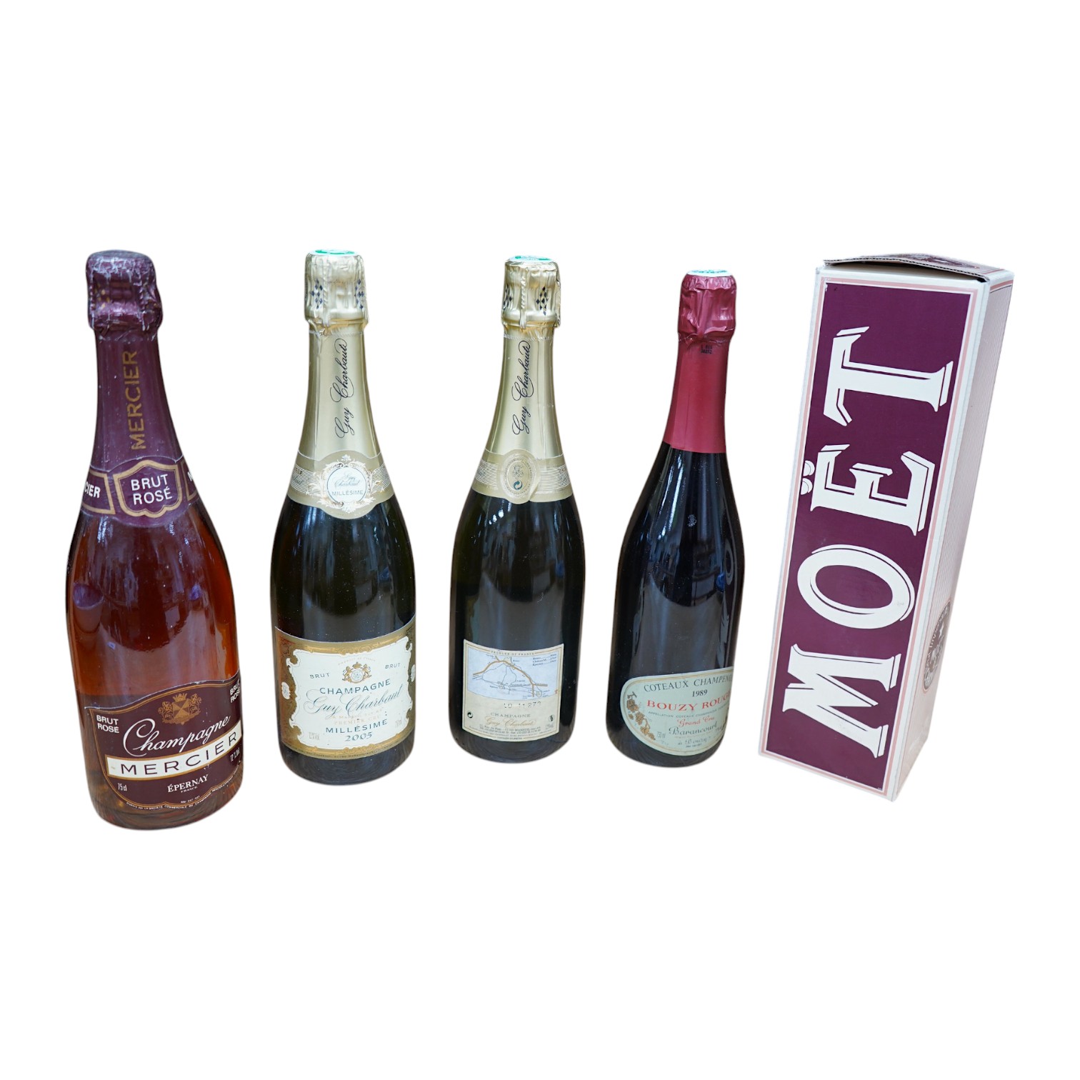 A boxed 1985 Moet Chandon Imperial Brut Rose, Two Guy Charbaut 2005 Champagnes, a bottle of Bouzy Rouge 1989 and a bottle of Mercier Rose (5). Condition - unknown storage